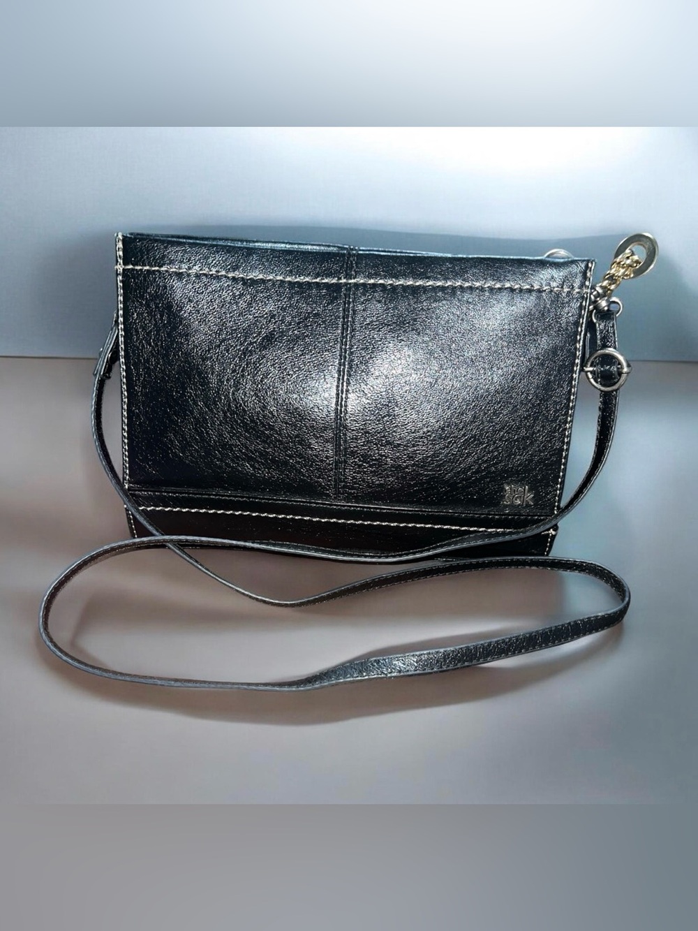 The Sak Black Leather Crossbody Bag with Gold Hardware